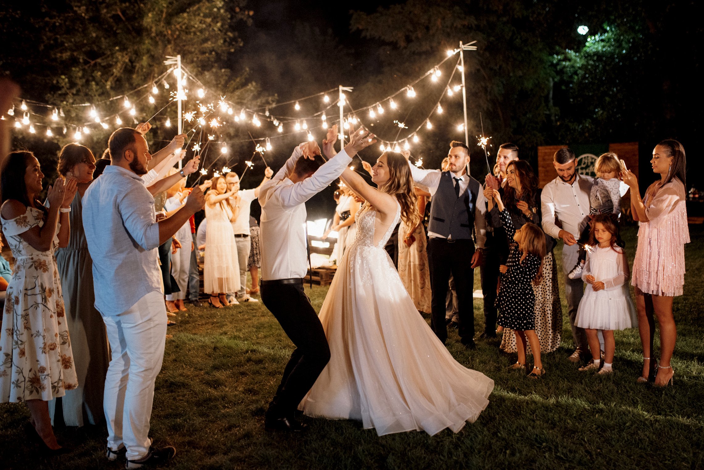 sparklers at the wedding of the newlyweds